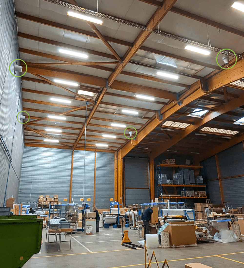 Installation Airius dans un entrepôt industriel pour la récupération de chaleur